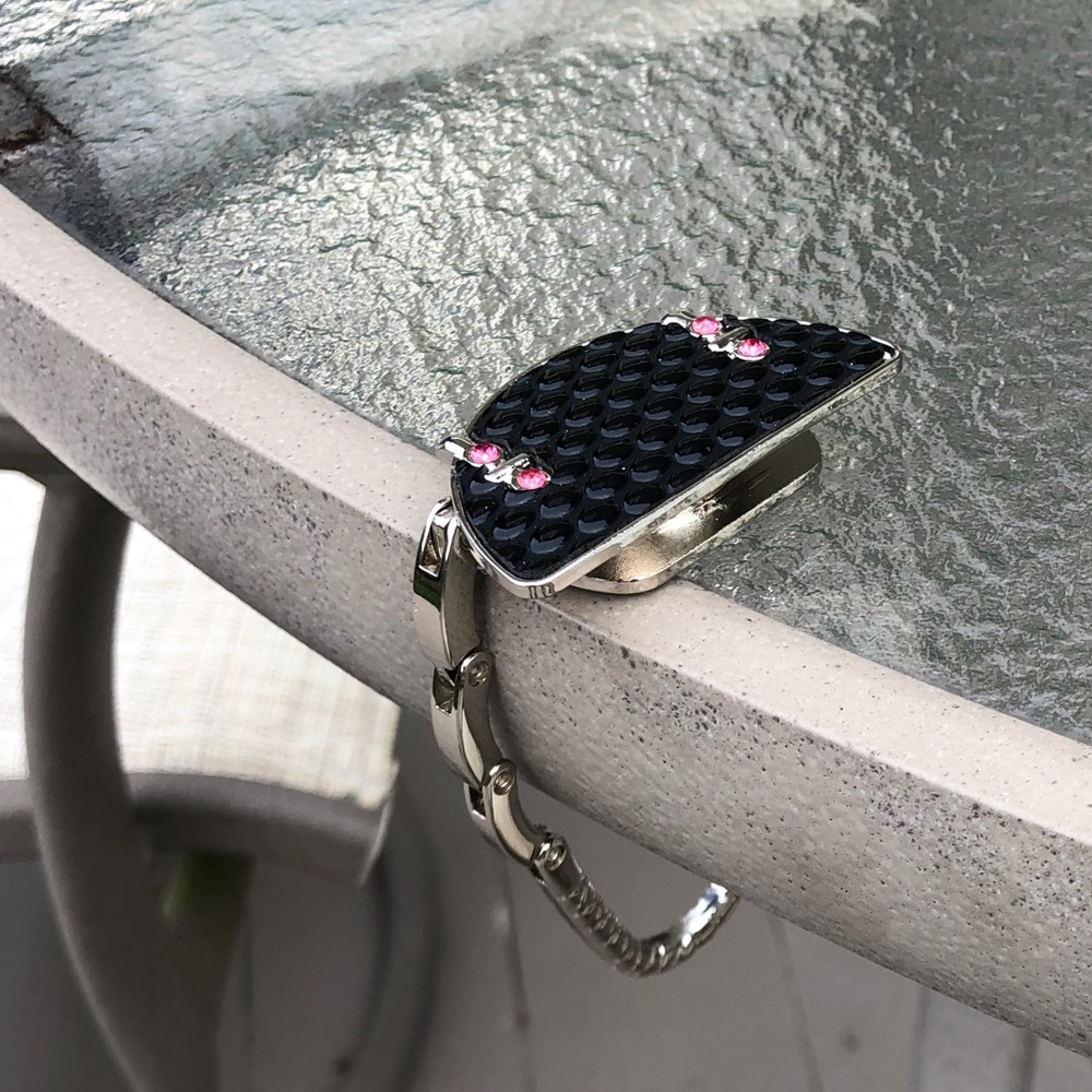 Hanger for handbag restaurant bars tables